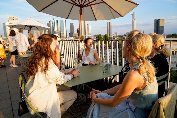 Networking on the OutOfOffice Westend roof terrace in Frankfurt